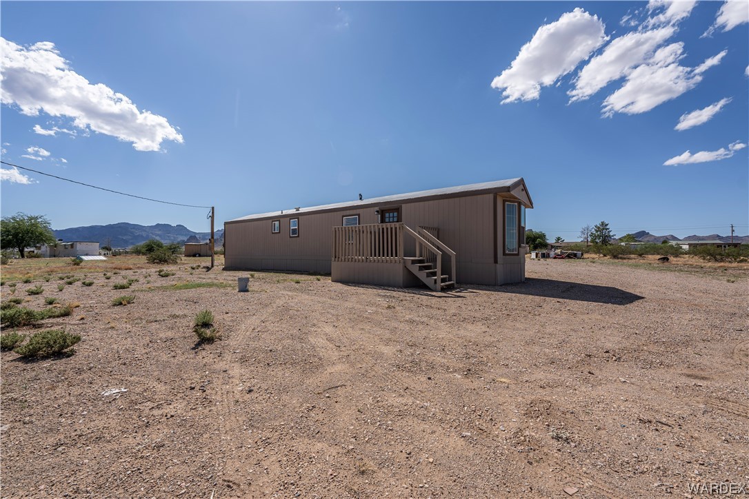 2337 South Canelo Road Golden Valley, AZ 86413 - Photo 15 of 30 a view of a dry area with a stove