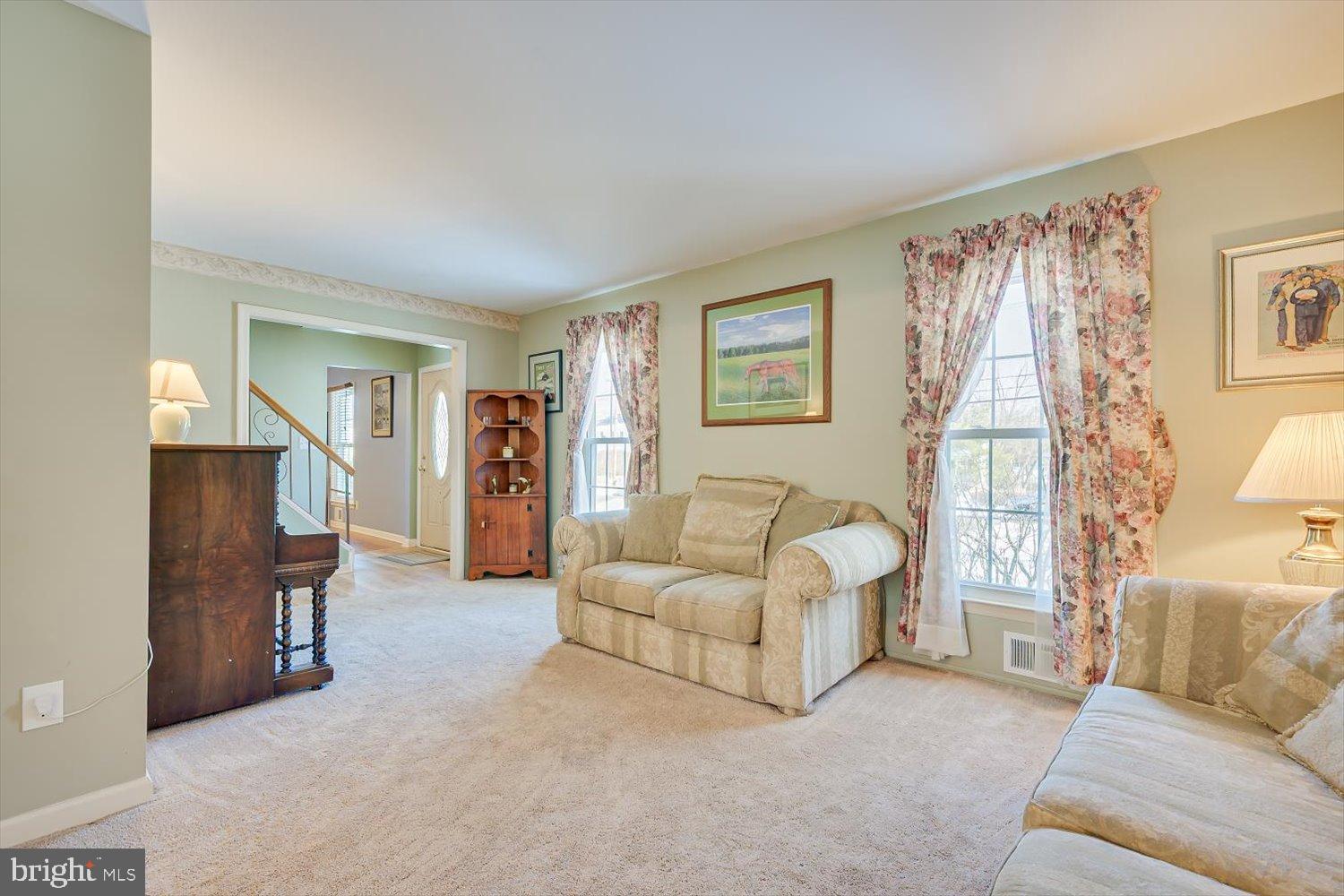 221 Hickory Corner Road East Windsor, NJ 08520 - Photo 12 of 29 Inviting living space with natural light.