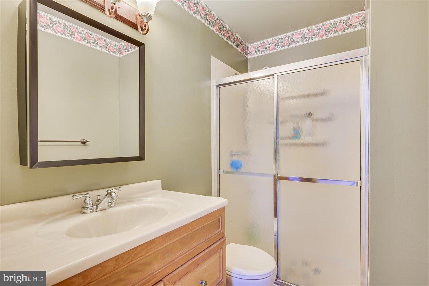 221 Hickory Corner Road East Windsor, NJ 08520 - Photo 16 of 29 Charming bathroom with floral accents.