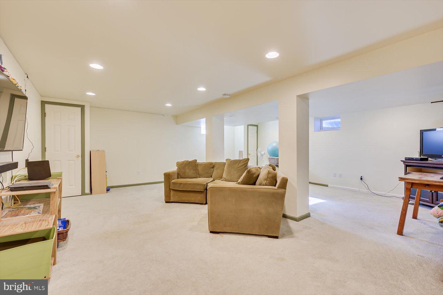 221 Hickory Corner Road East Windsor, NJ 08520 - Photo 24 of 29 Spacious, versatile basement retreat.