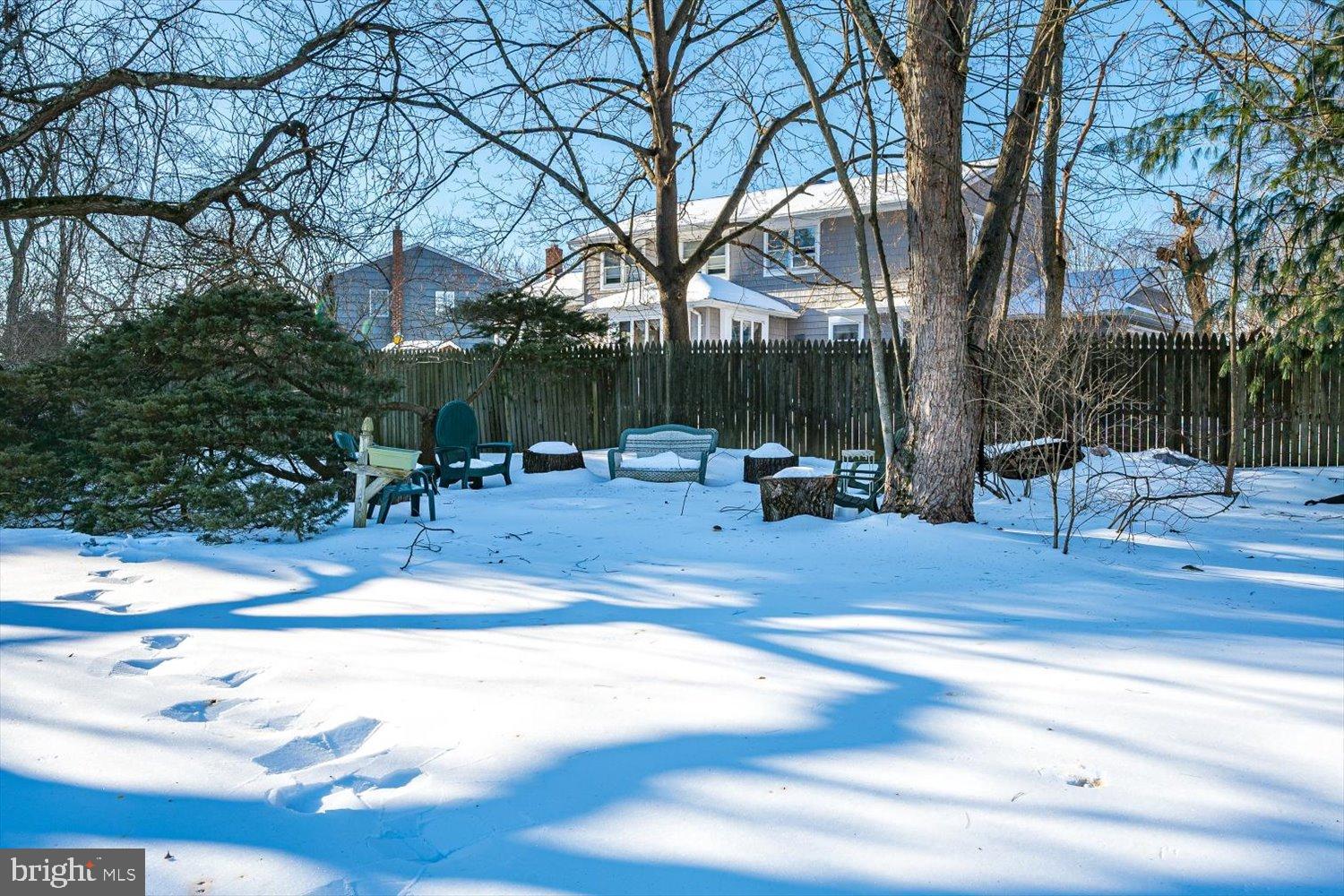 221 Hickory Corner Road East Windsor, NJ 08520 - Photo 27 of 29 Winter's embrace in a serene backyard retreat.