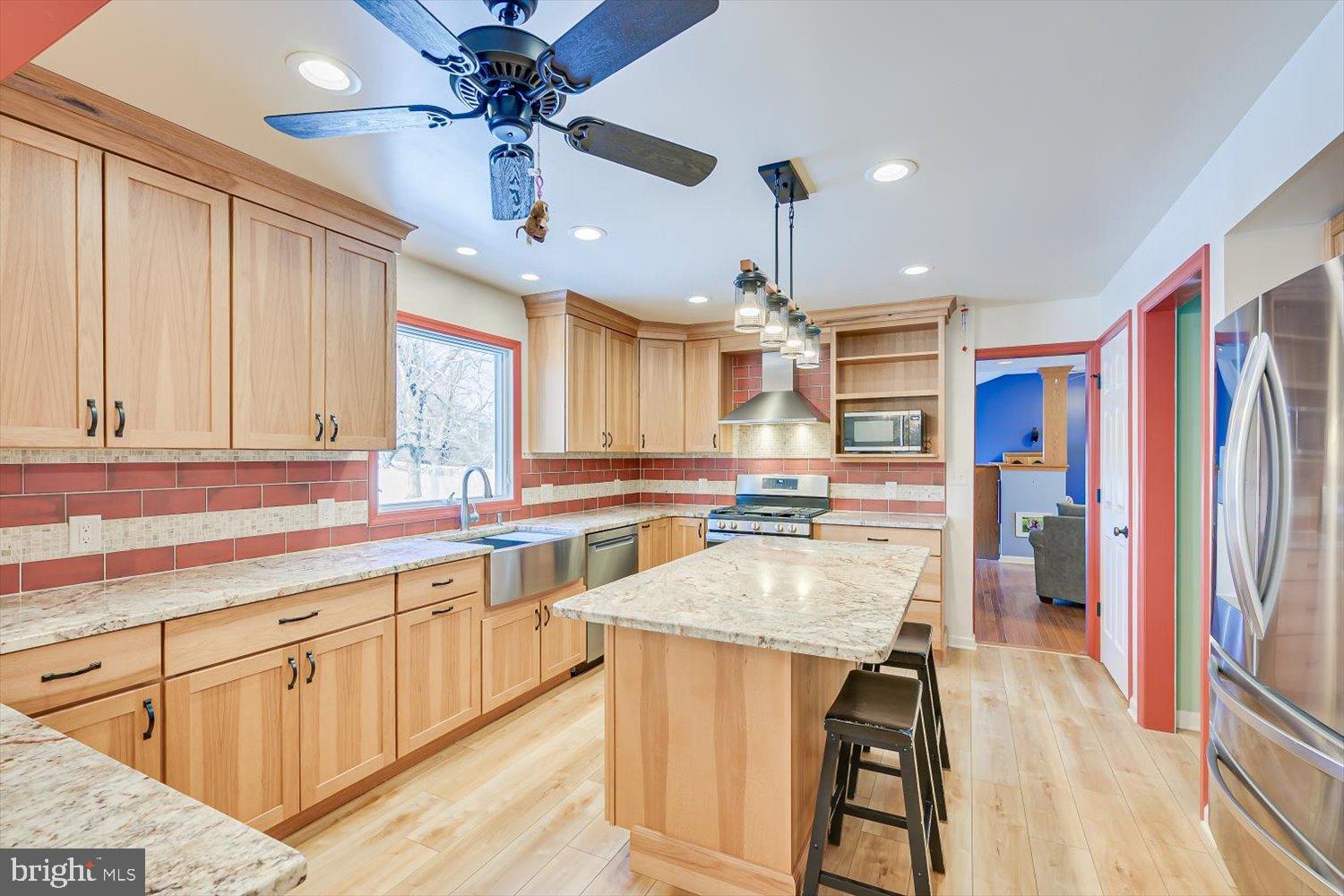 221 Hickory Corner Road East Windsor, NJ 08520 - Photo 3 of 29 Modern kitchen with warm wood accents.