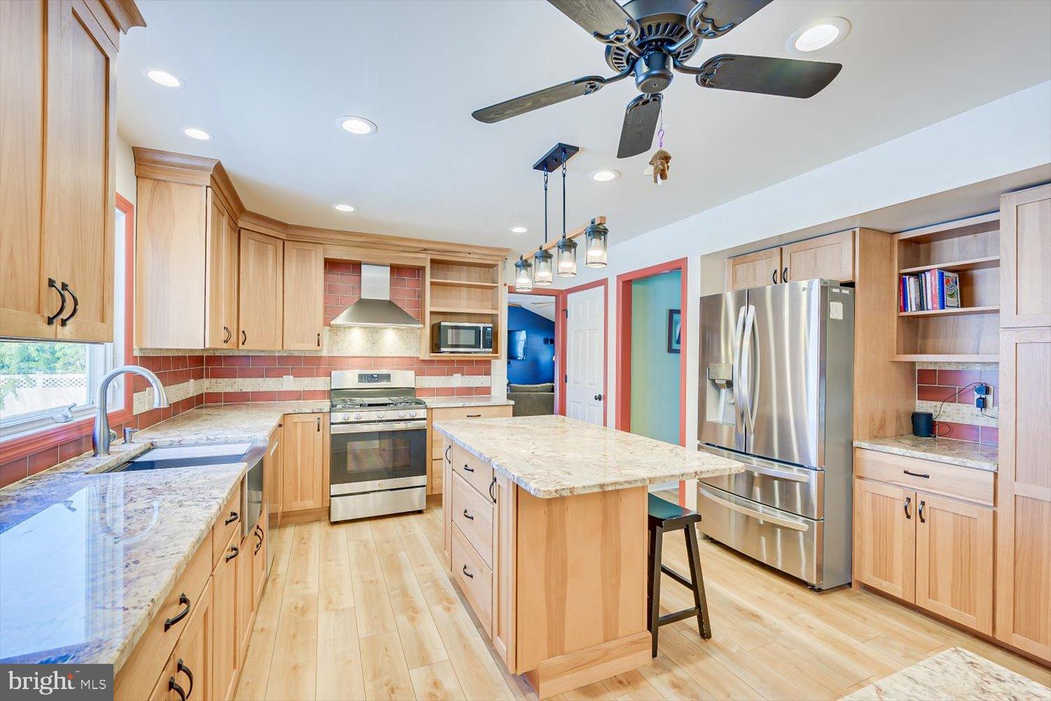 221 Hickory Corner Road East Windsor, NJ 08520 - Photo 6 of 29 Modern kitchen with warm wood accents.