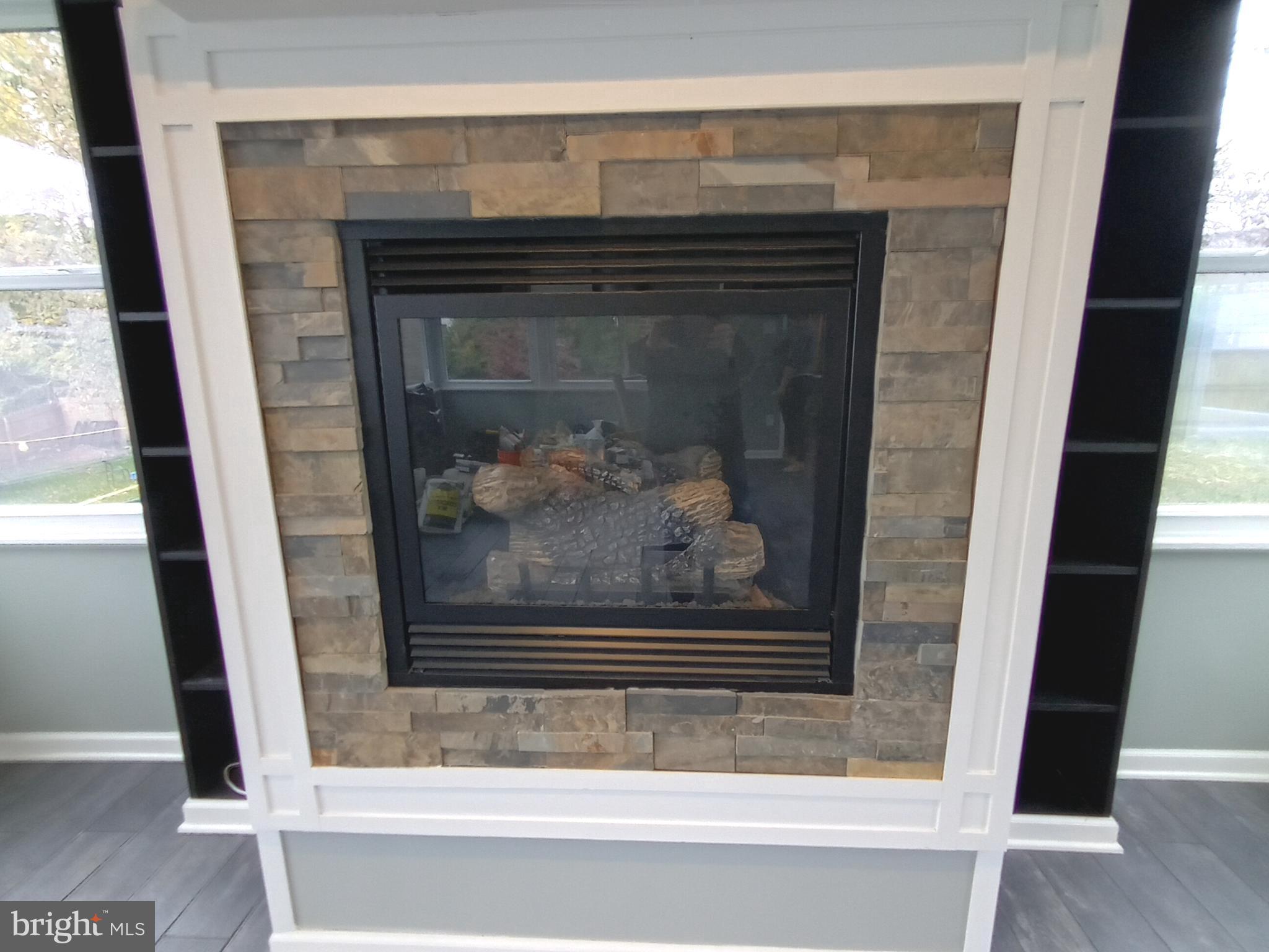 11305 Galt Avenue Silver Spring, MD 20902 - Photo 4 of 32 Gas fireplace turns on with a flip of a switch