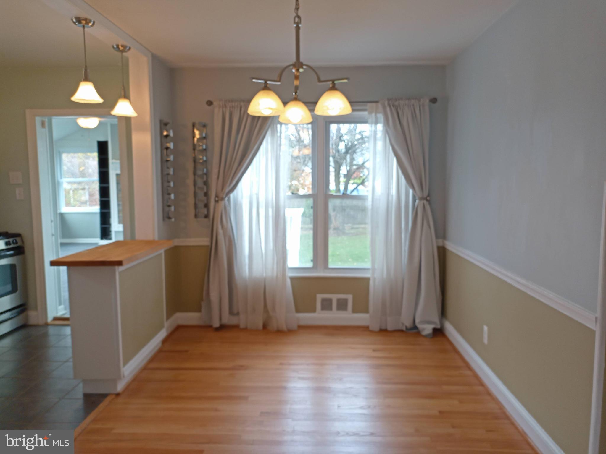 11305 Galt Avenue Silver Spring, MD 20902 - Photo 10 of 32 Newly finished hardwood floors.