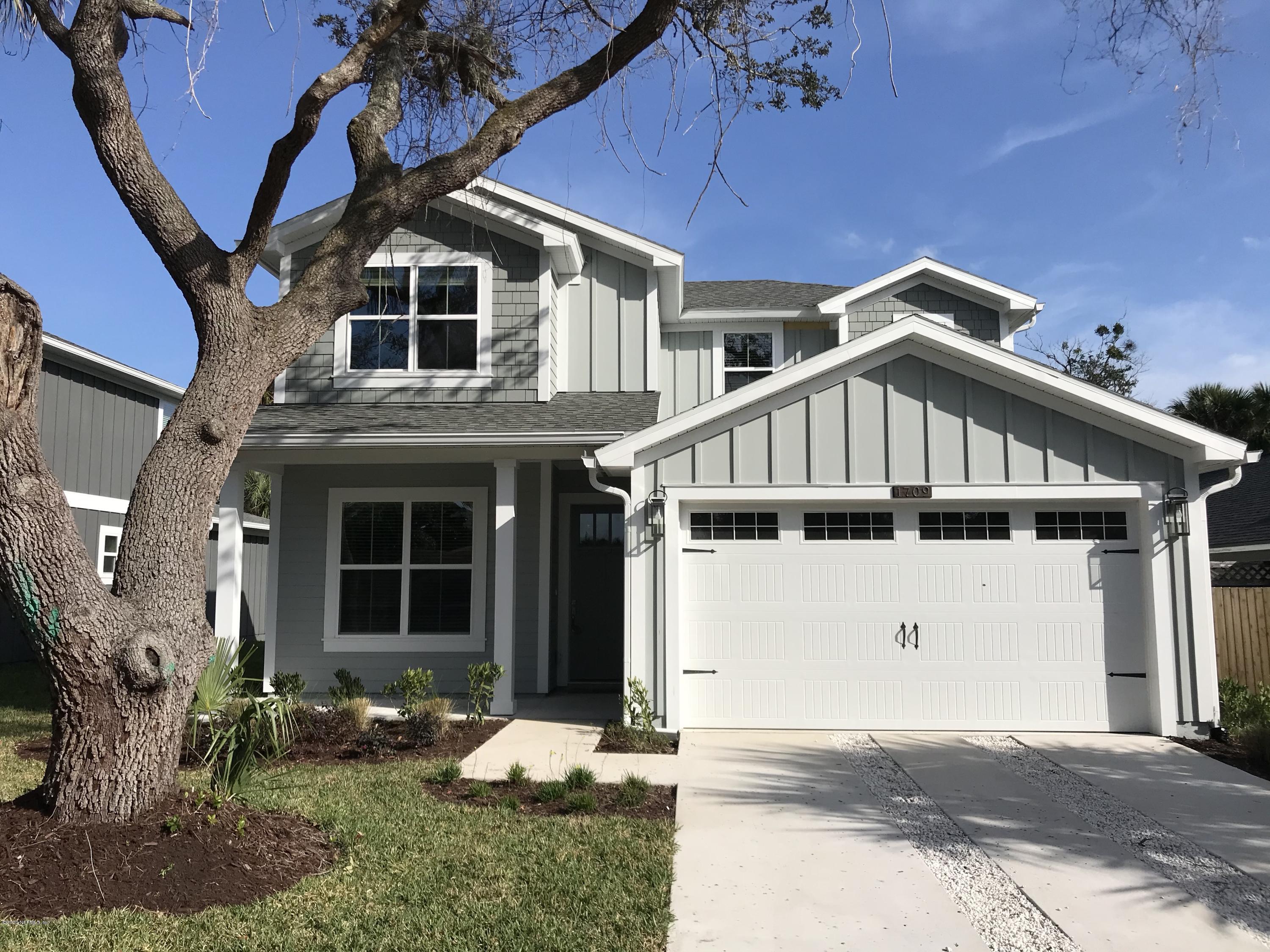 1709 Riley Street Jacksonville Beach, FL 32250 - Photo 1 of 42 a view of a house with a yard