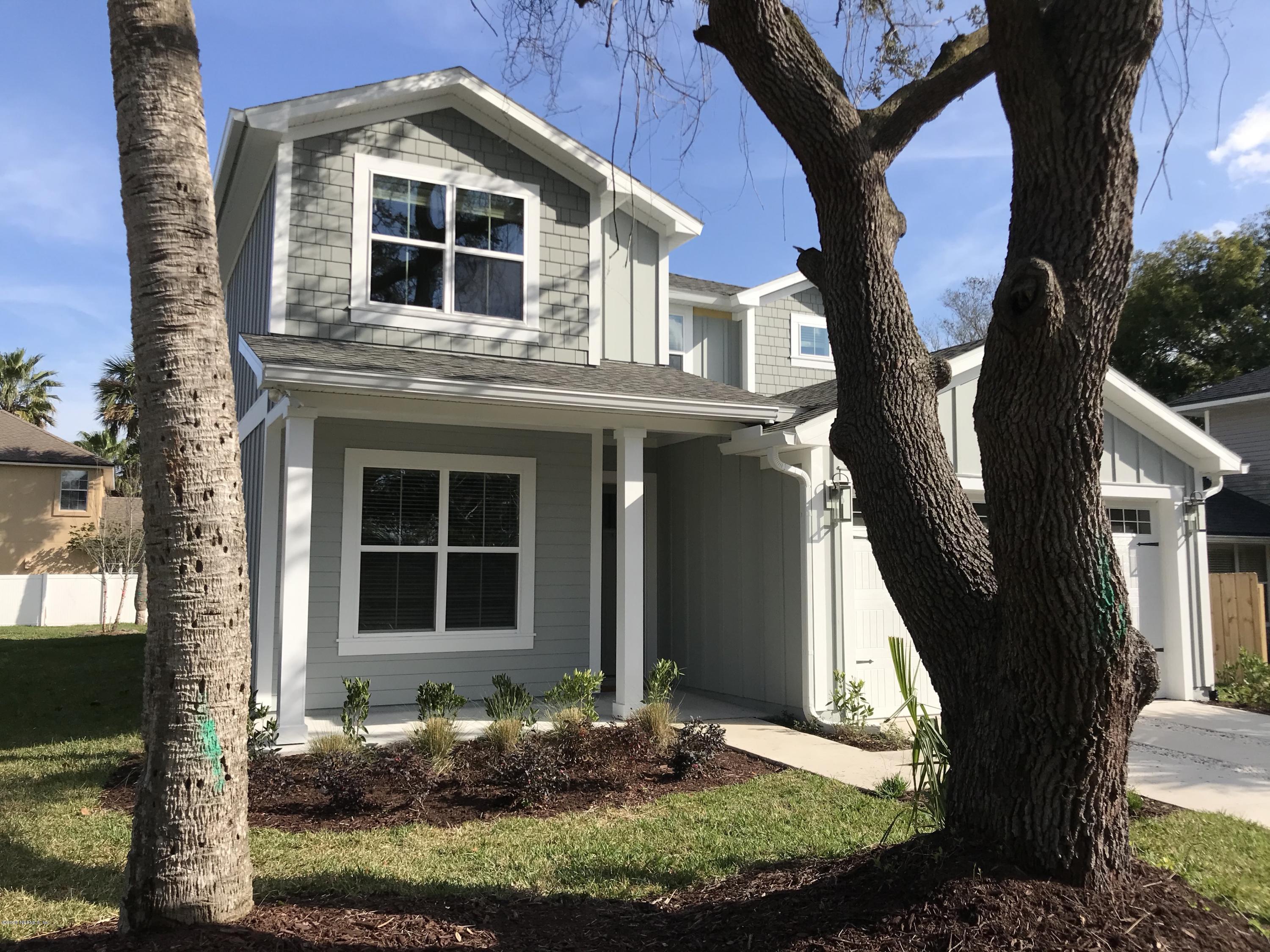 1709 Riley Street Jacksonville Beach, FL 32250 - Photo 2 of 42 a front view of a house with garden