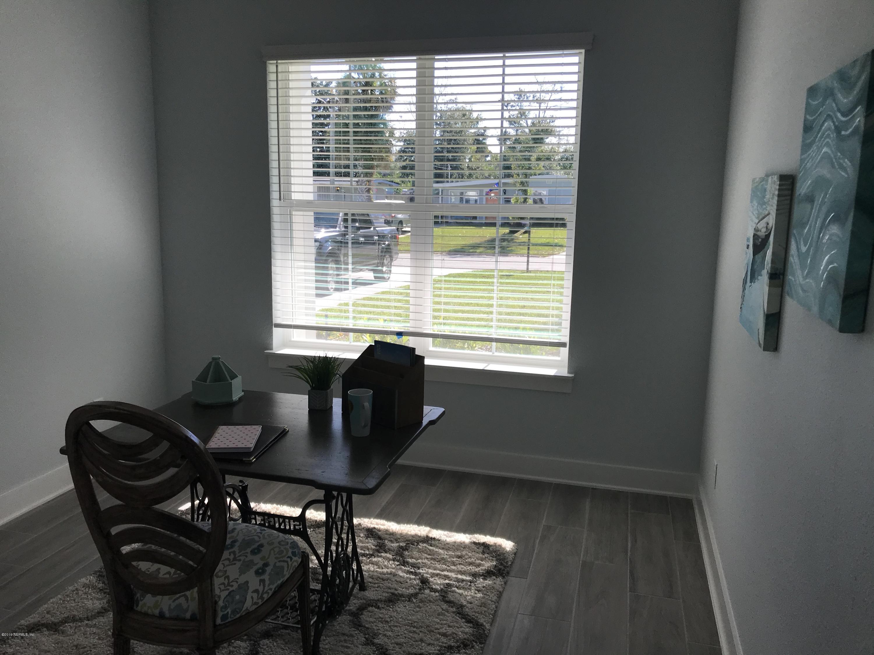 1709 Riley Street Jacksonville Beach, FL 32250 - Photo 27 of 42 a workspace with furniture and a window