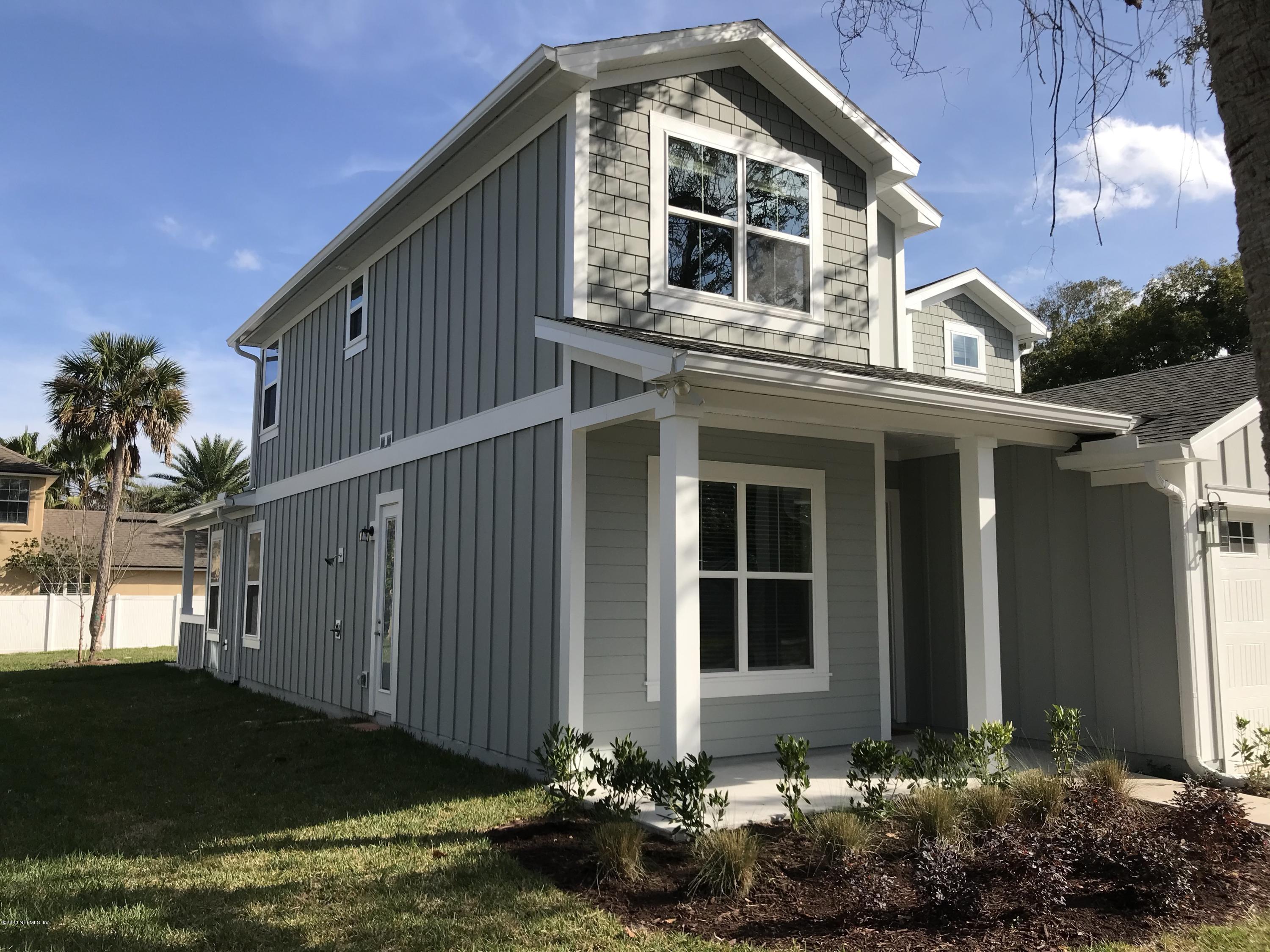 1709 Riley Street Jacksonville Beach, FL 32250 - Photo 3 of 42 a front view of a house with a yard
