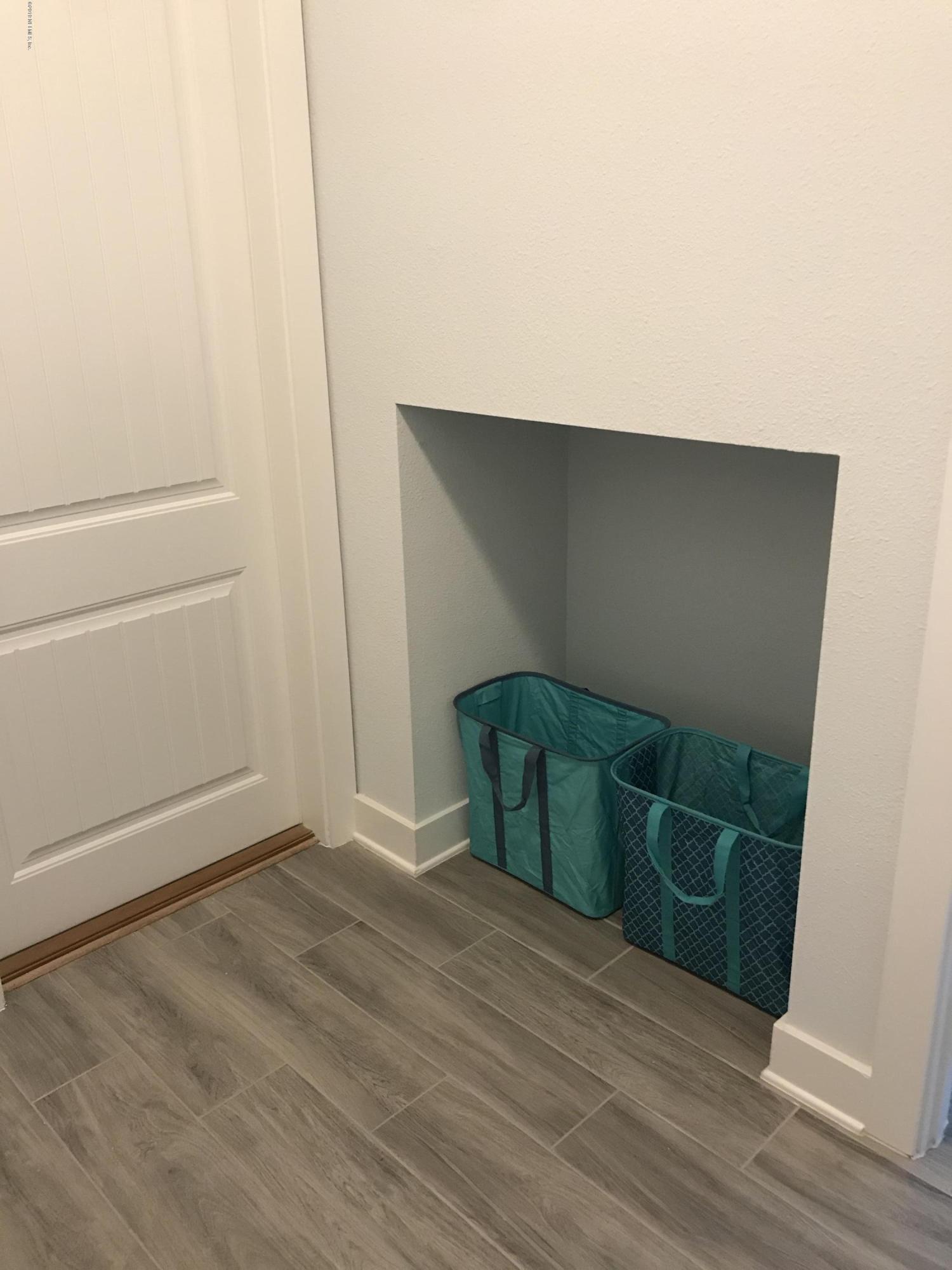 1709 Riley Street Jacksonville Beach, FL 32250 - Photo 31 of 42 a view of an empty room with wooden floor