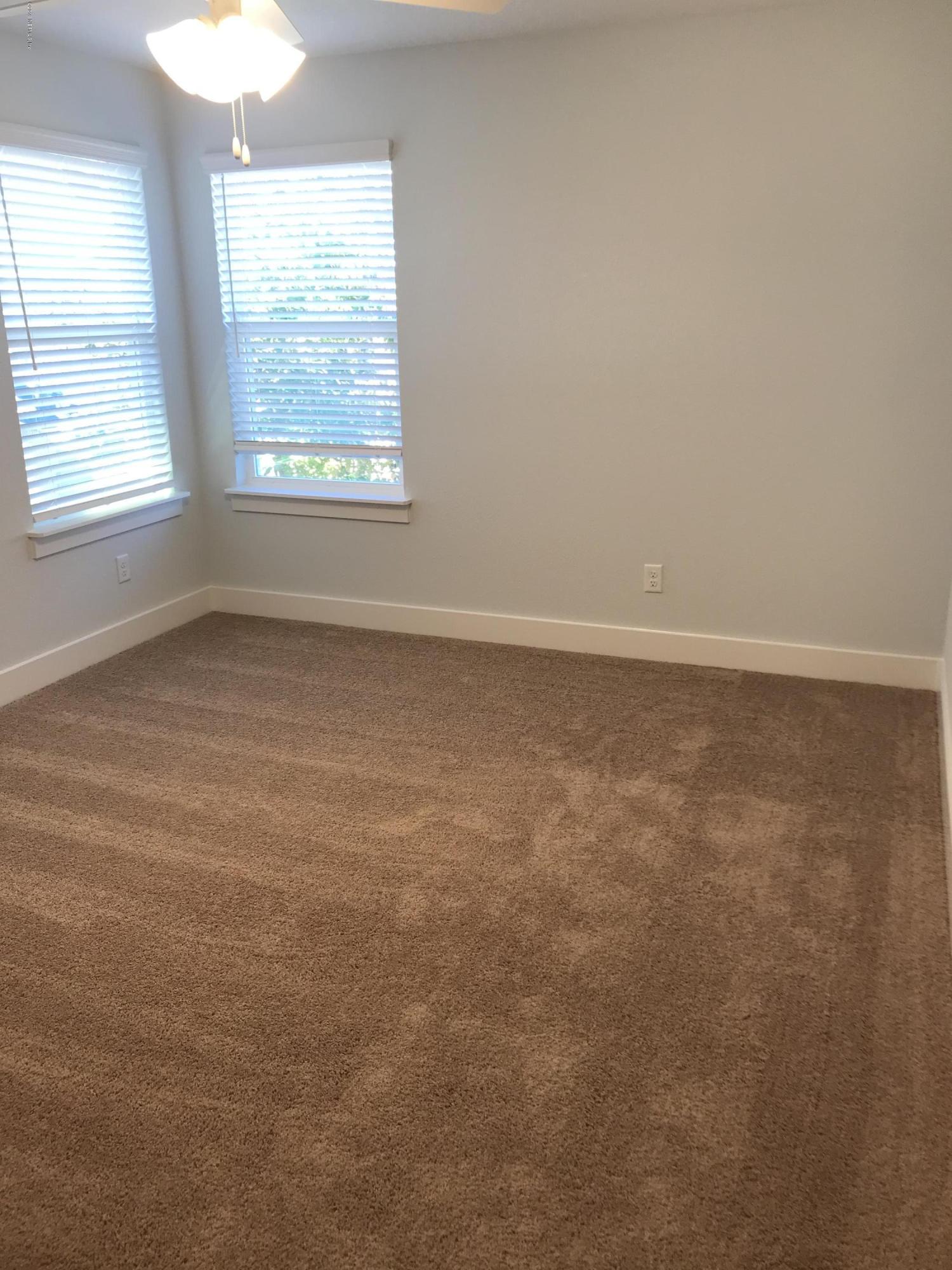 1709 Riley Street Jacksonville Beach, FL 32250 - Photo 34 of 42 an empty room with a window