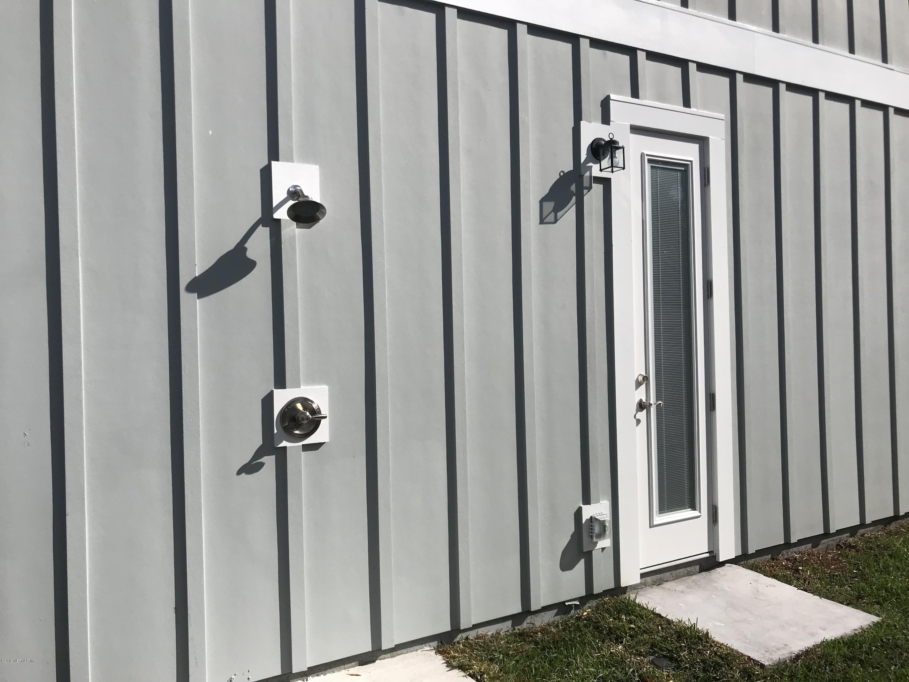 1709 Riley Street Jacksonville Beach, FL 32250 - Photo 6 of 42 a view of a bathroom with a shower