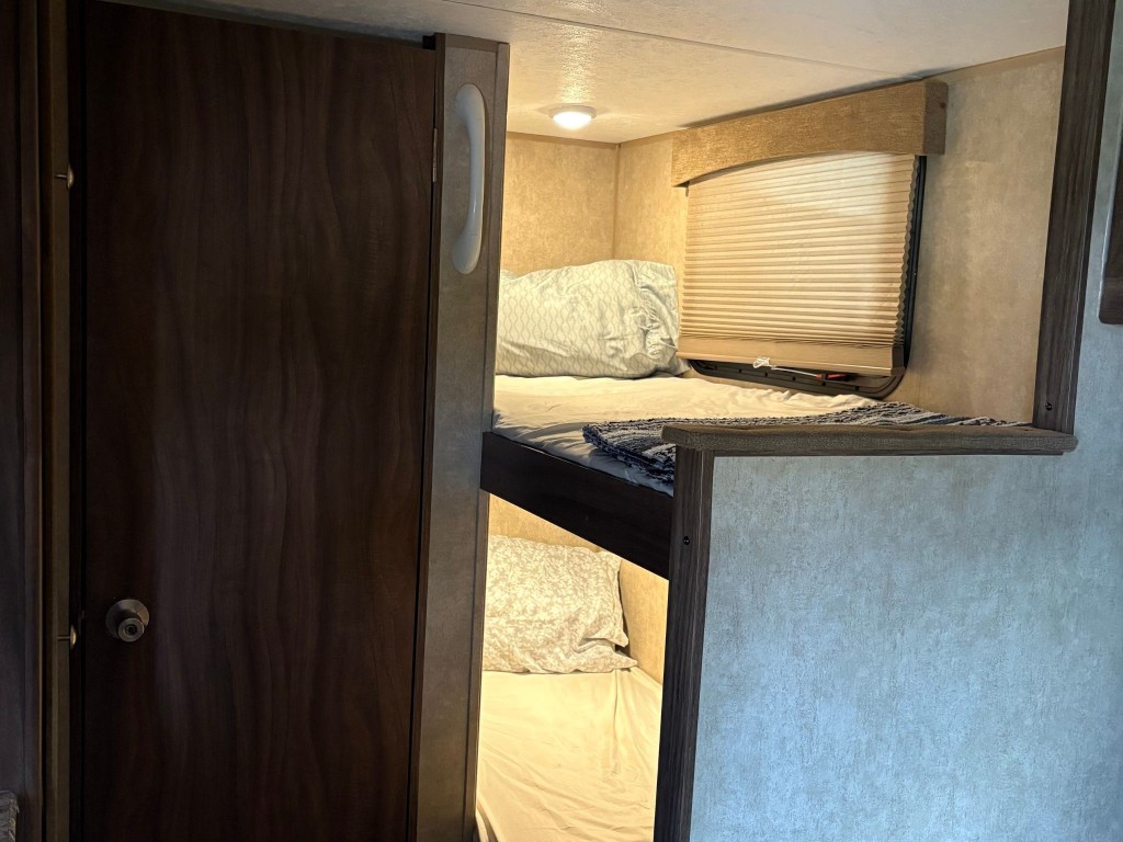 1256 Resort Road Crystal Beach, TX 77650 - Photo 12 of 21 Twin bunk bed inside RV