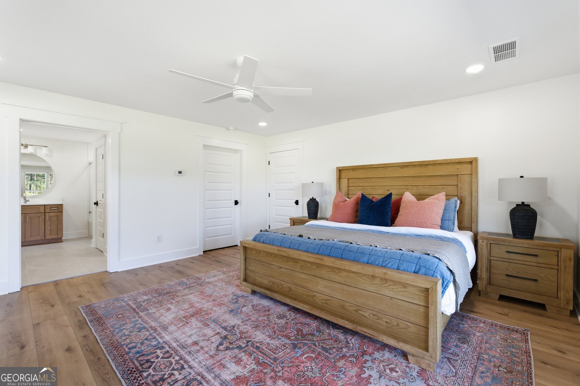 5938 Ridgeway Road Franklin, GA 30217 - Photo 25 of 41 a spacious bedroom with a bed and a dresser