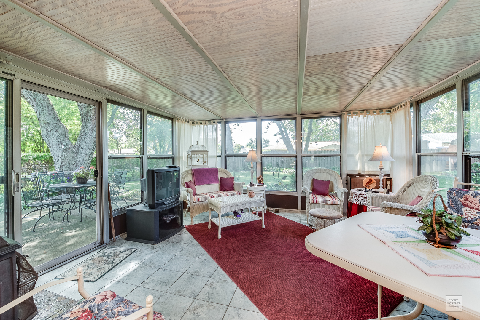 115 Neil Road Sugar Grove, IL 60554 - Photo 11 of 21 a living room with furniture large windows and wooden floor
