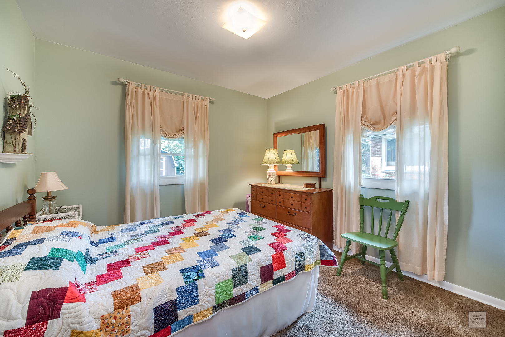 115 Neil Road Sugar Grove, IL 60554 - Photo 15 of 21 a bedroom with a bed and a dresser next to a window
