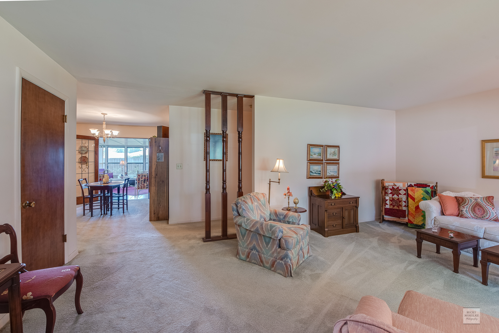 115 Neil Road Sugar Grove, IL 60554 - Photo 4 of 21 a living room with furniture and a dining table with bookshelf
