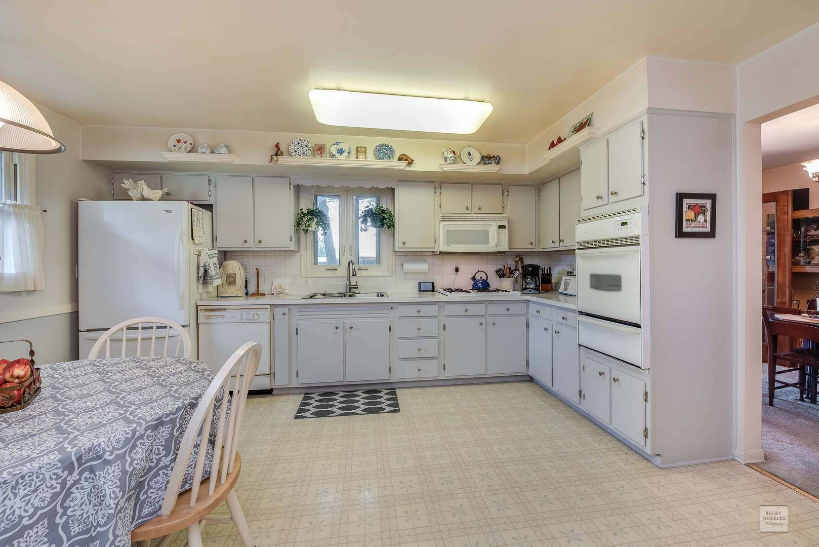 115 Neil Road Sugar Grove, IL 60554 - Photo 7 of 21 a kitchen with stainless steel appliances granite countertop a refrigerator sink and cabinets