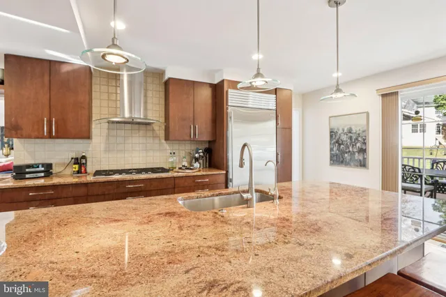a work room with furniture and wooden floor