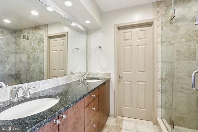 a room with furniture a rug and a window