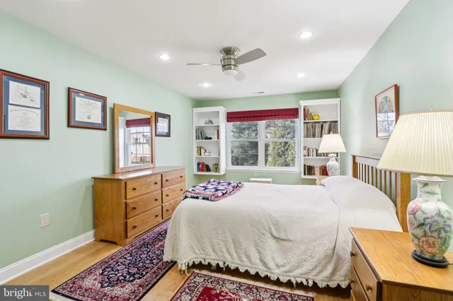 an aerial view of a house with outdoor space swimming pool and lake view