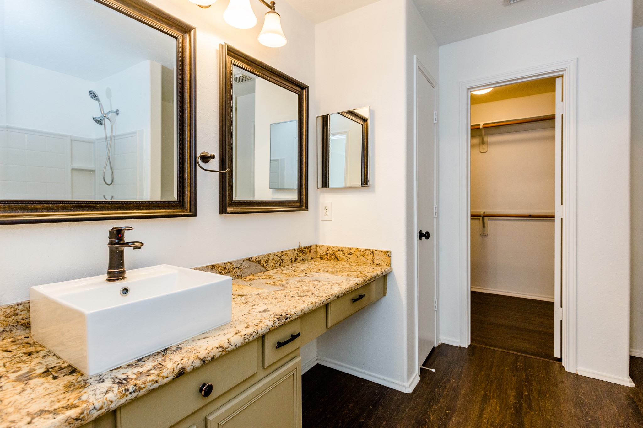 2834 Trinity Glen Lane Houston, TX 77047 - Photo 19 of 30 Beautifully updated master bathroom with vanity and huge walk-in closet!