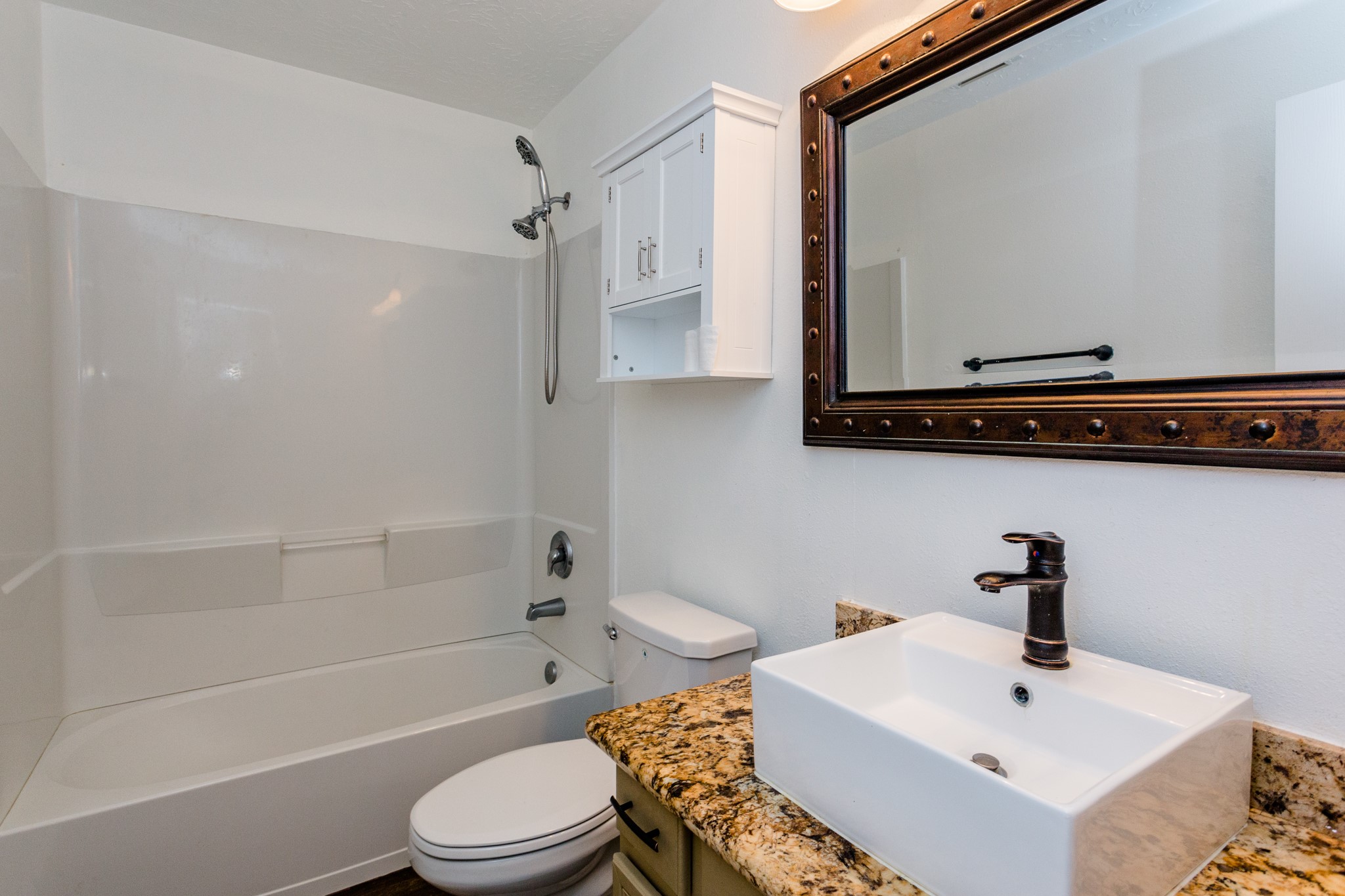 2834 Trinity Glen Lane Houston, TX 77047 - Photo 26 of 30 Beautiful updated bathroom conveniently located between bedroom 2 and 3.