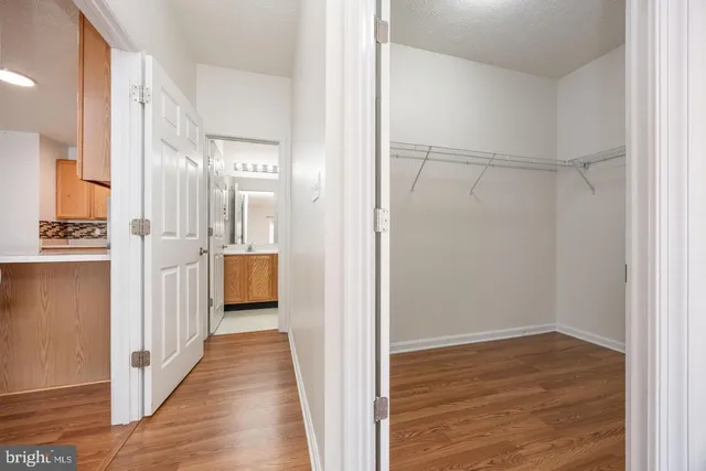 a bathroom with a double vanity sink and mirror