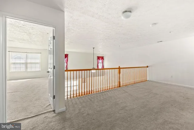 a bathroom with a sink a mirror and shower
