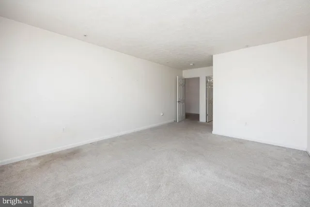 a big house with a big yard and large trees