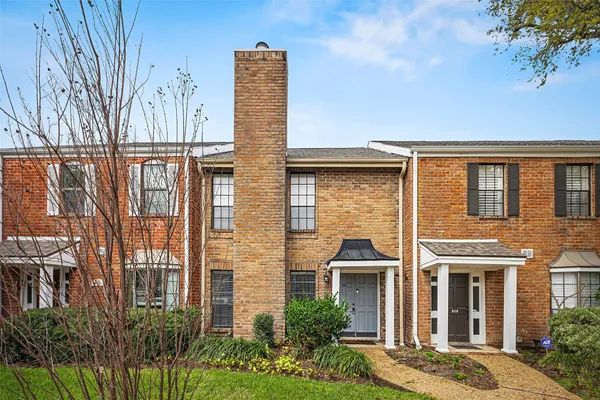 front view of a house with a street
