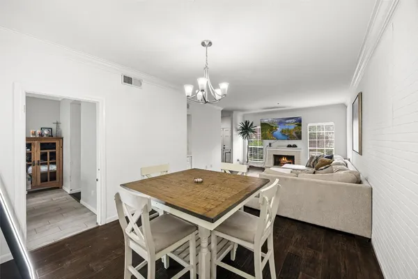 a kitchen with stainless steel appliances granite countertop a stove microwave and refrigerator