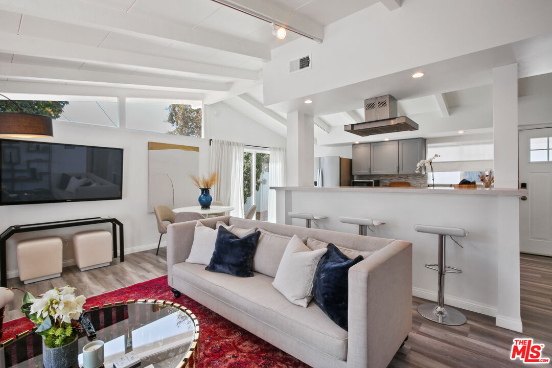 6440 Rhea Avenue Reseda, CA 91335 - Photo 3 of 22 a living room with furniture and flat screen tv