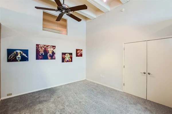 a view of a hallway with closet