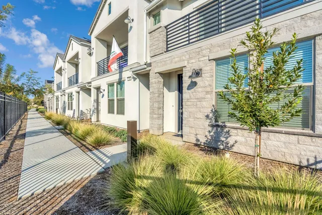 a view of a house with a swimming pool