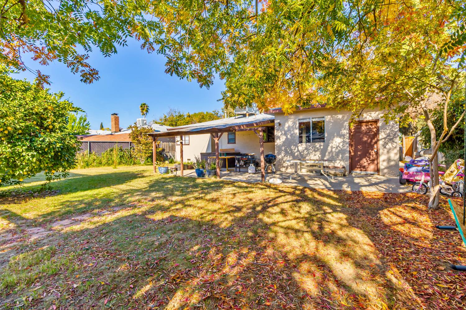 3852 East Washington Avenue Fresno, CA 93702 - Photo 21 of 30 a view of a house with swimming pool