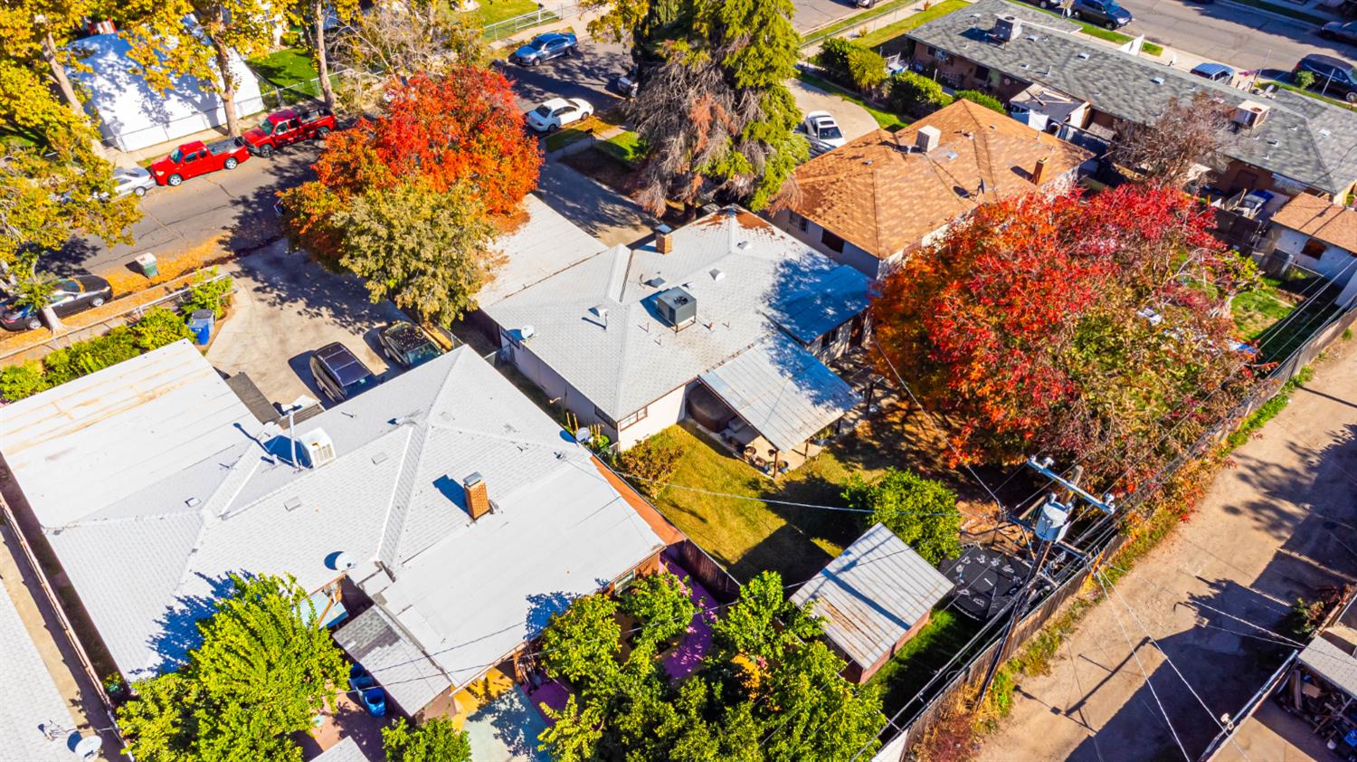 3852 East Washington Avenue Fresno, CA 93702 - Photo 24 of 30 an aerial view of a house with swimming pool and lawn chairs