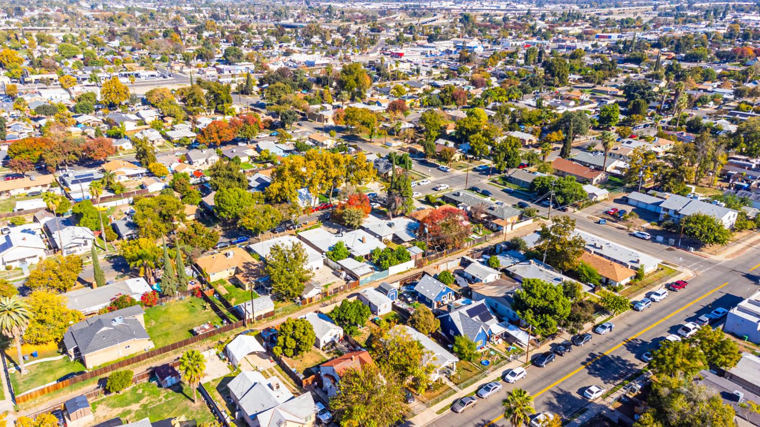 3852 East Washington Avenue Fresno, CA 93702 - Photo 25 of 30 an aerial view of residential houses with outdoor space