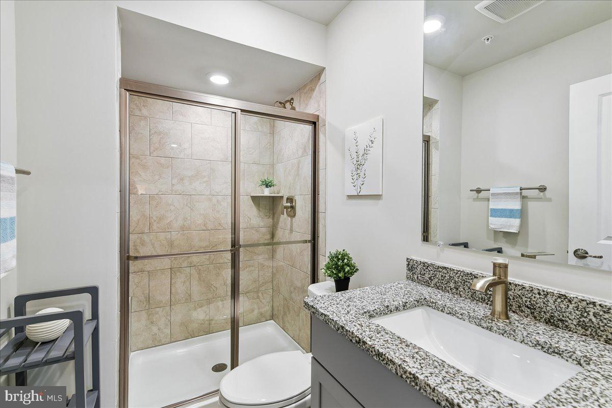 2209 Woodlands Road Windsor Mill, MD 21244 - Photo 44 of 75 3RD FULL BATH W/ WALK IN SHOWER & GRANITE COUNTER