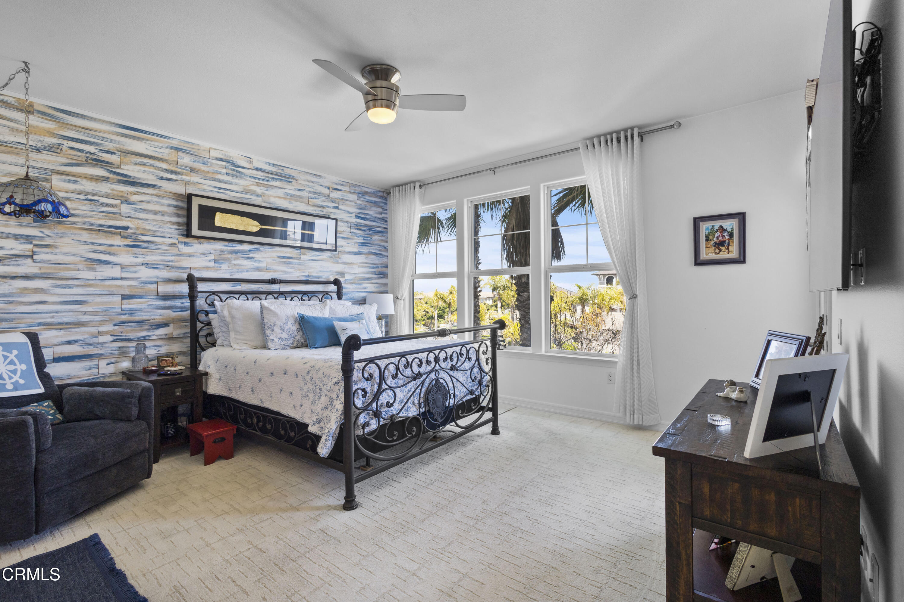 1536 Seabridge Lane Oxnard, CA 93035 - Photo 11 of 38 a bedroom with a bed and a couch