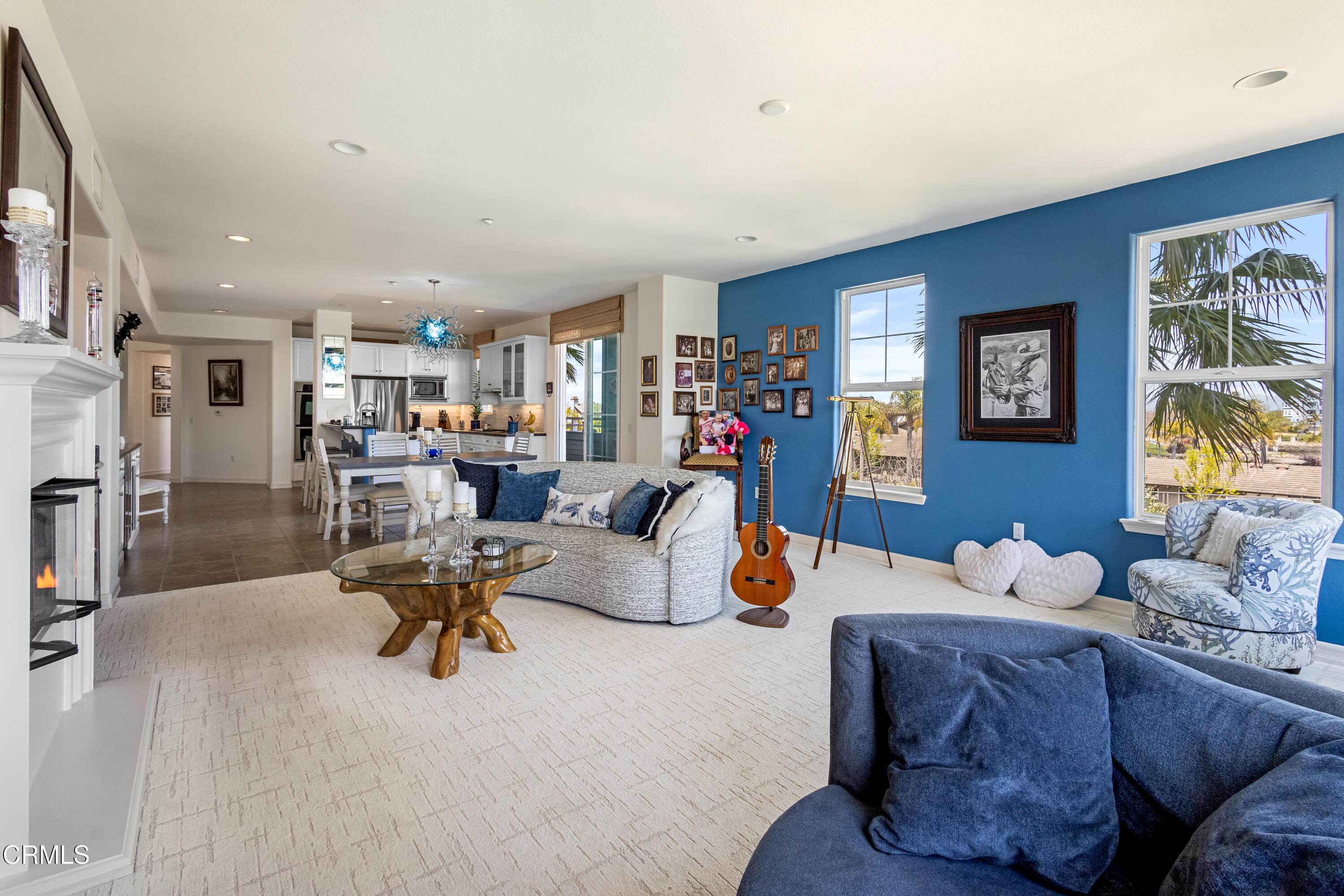 1536 Seabridge Lane Oxnard, CA 93035 - Photo 24 of 38 a living room with furniture kitchen and a table