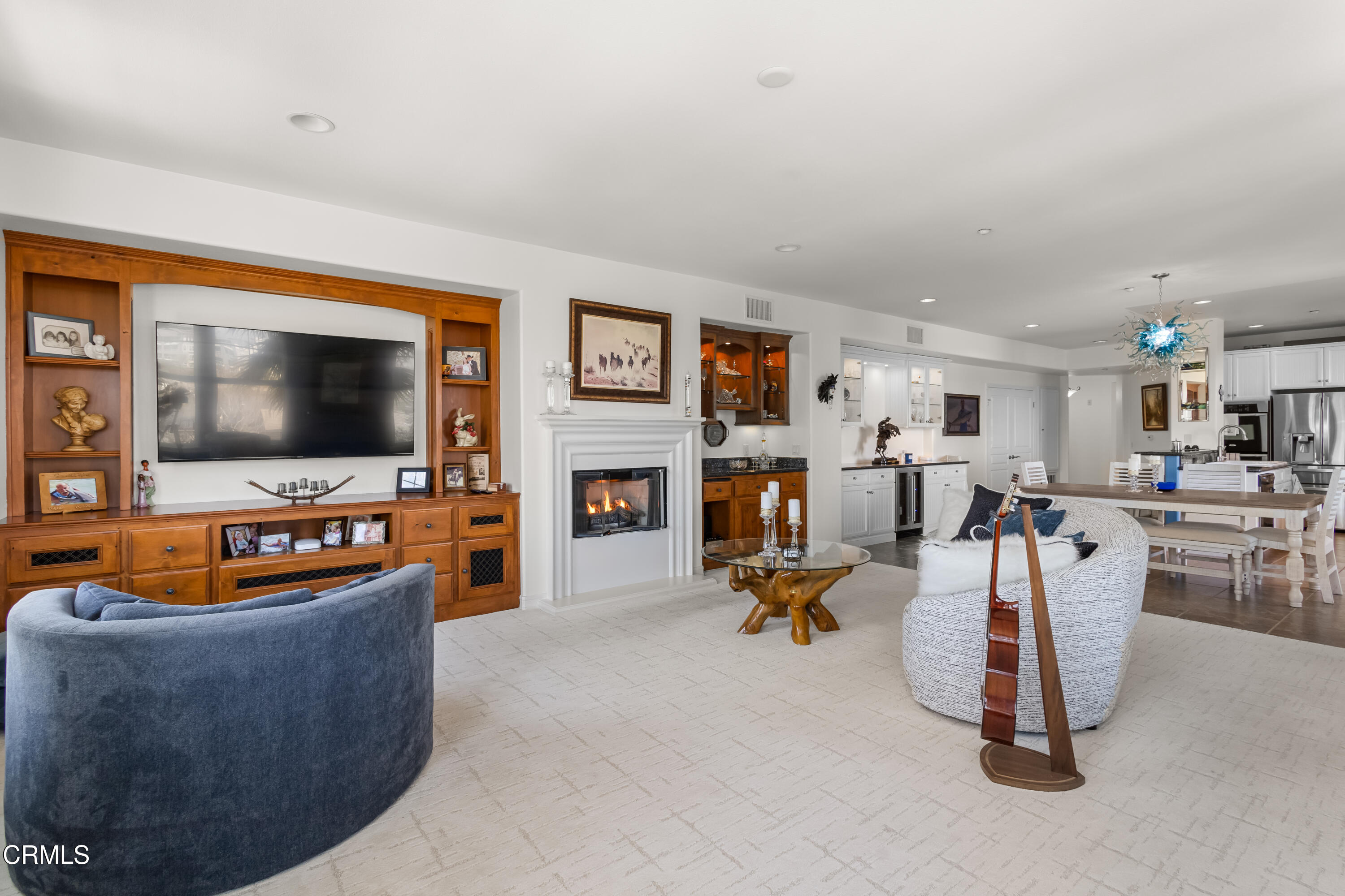 1536 Seabridge Lane Oxnard, CA 93035 - Photo 25 of 38 a living room with furniture and a flat screen tv