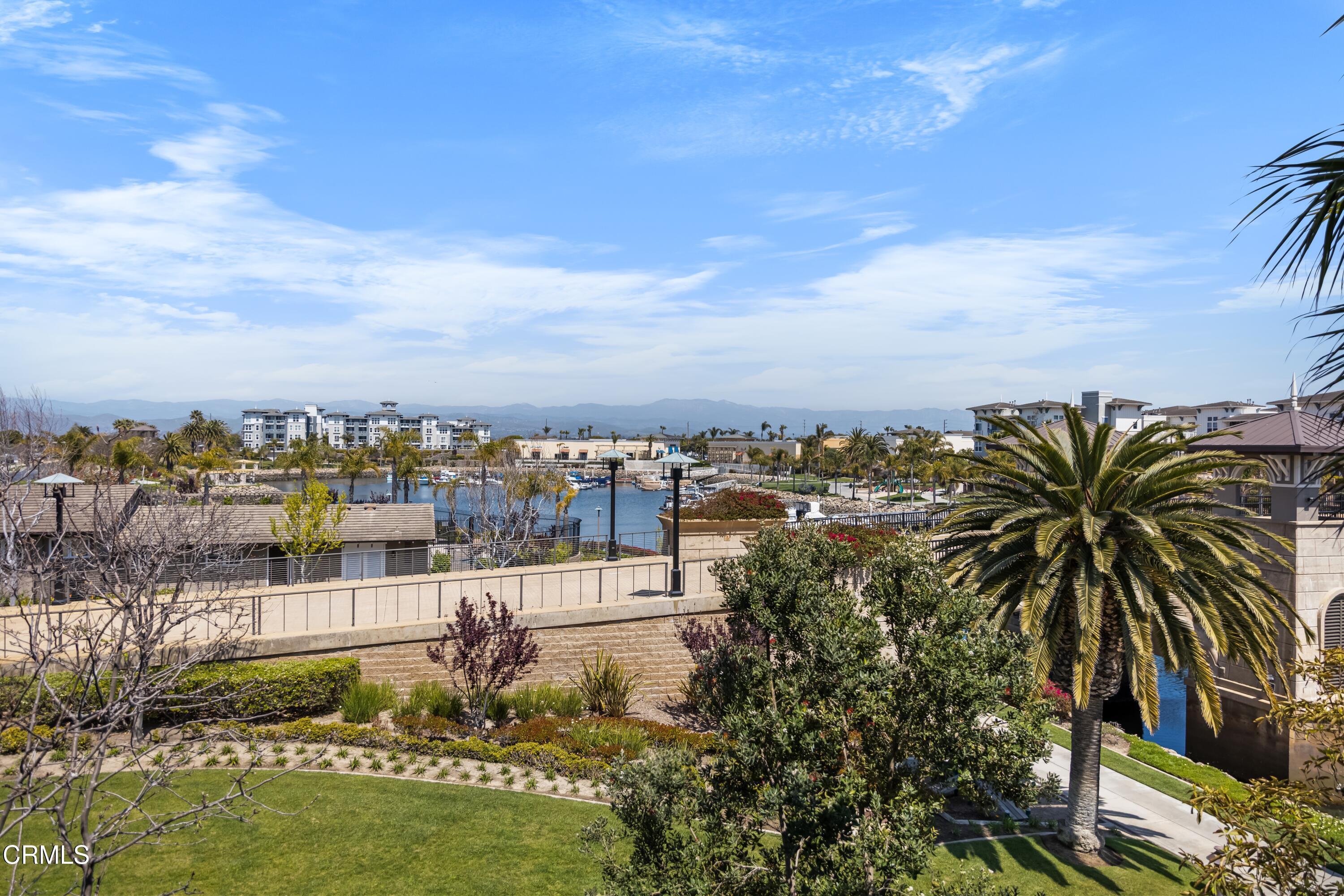 1536 Seabridge Lane Oxnard, CA 93035 - Photo 27 of 38 a view of a lake with houses
