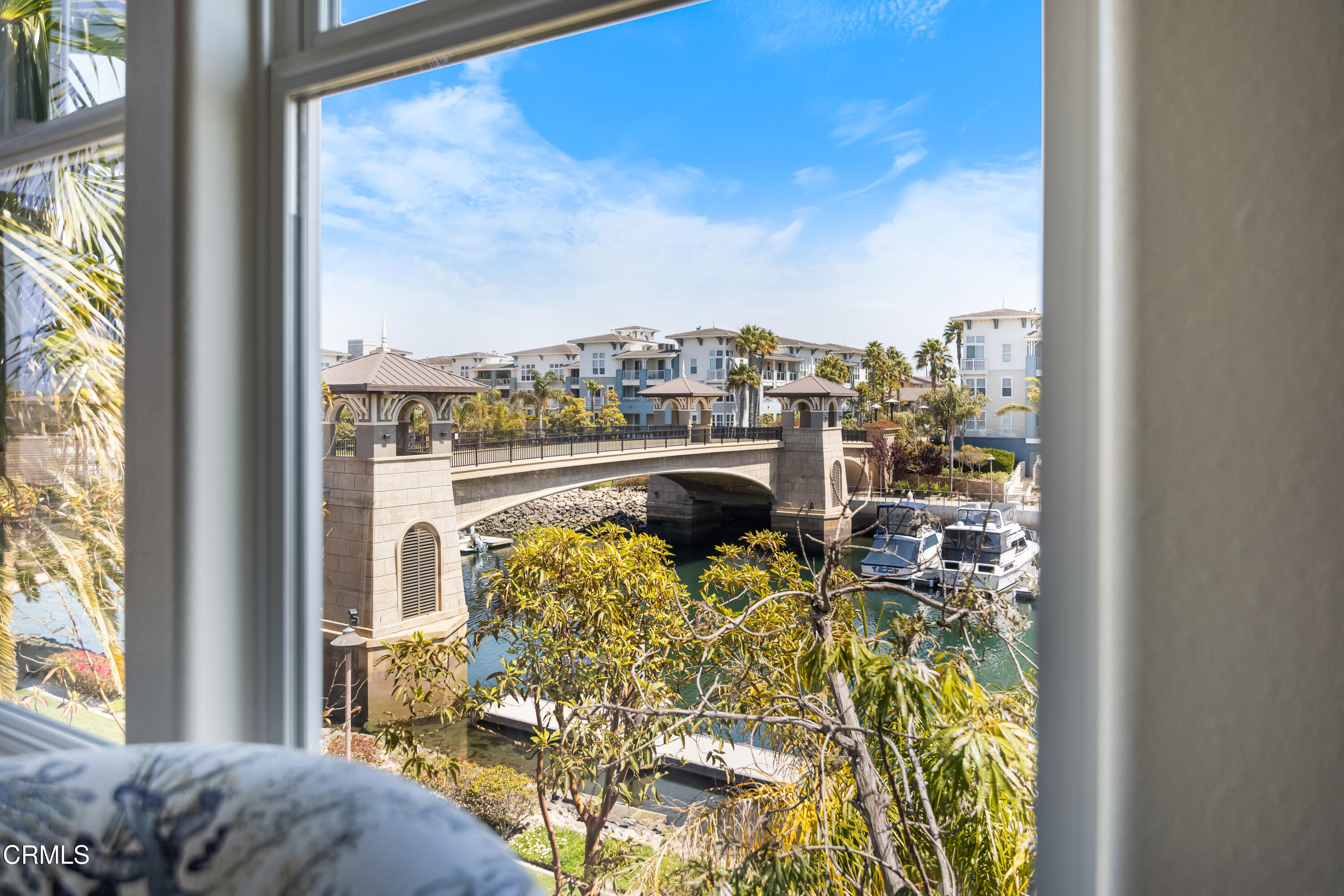 1536 Seabridge Lane Oxnard, CA 93035 - Photo 28 of 38 a view of a balcony with chair and table