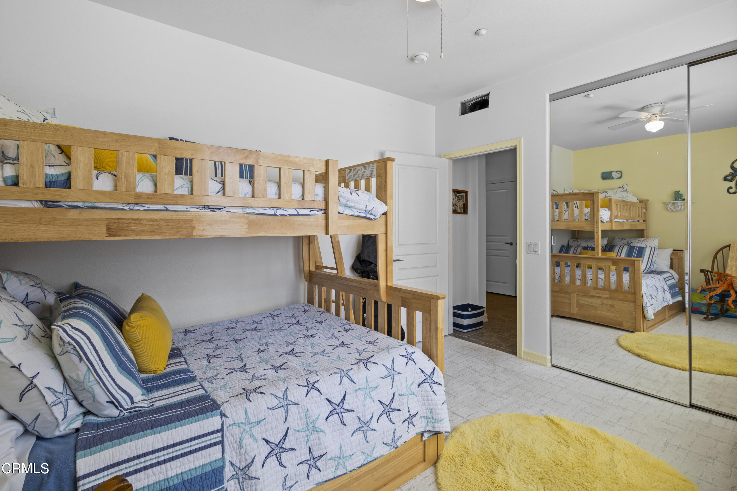 1536 Seabridge Lane Oxnard, CA 93035 - Photo 5 of 38 a bedroom with a bed a couch and dresser