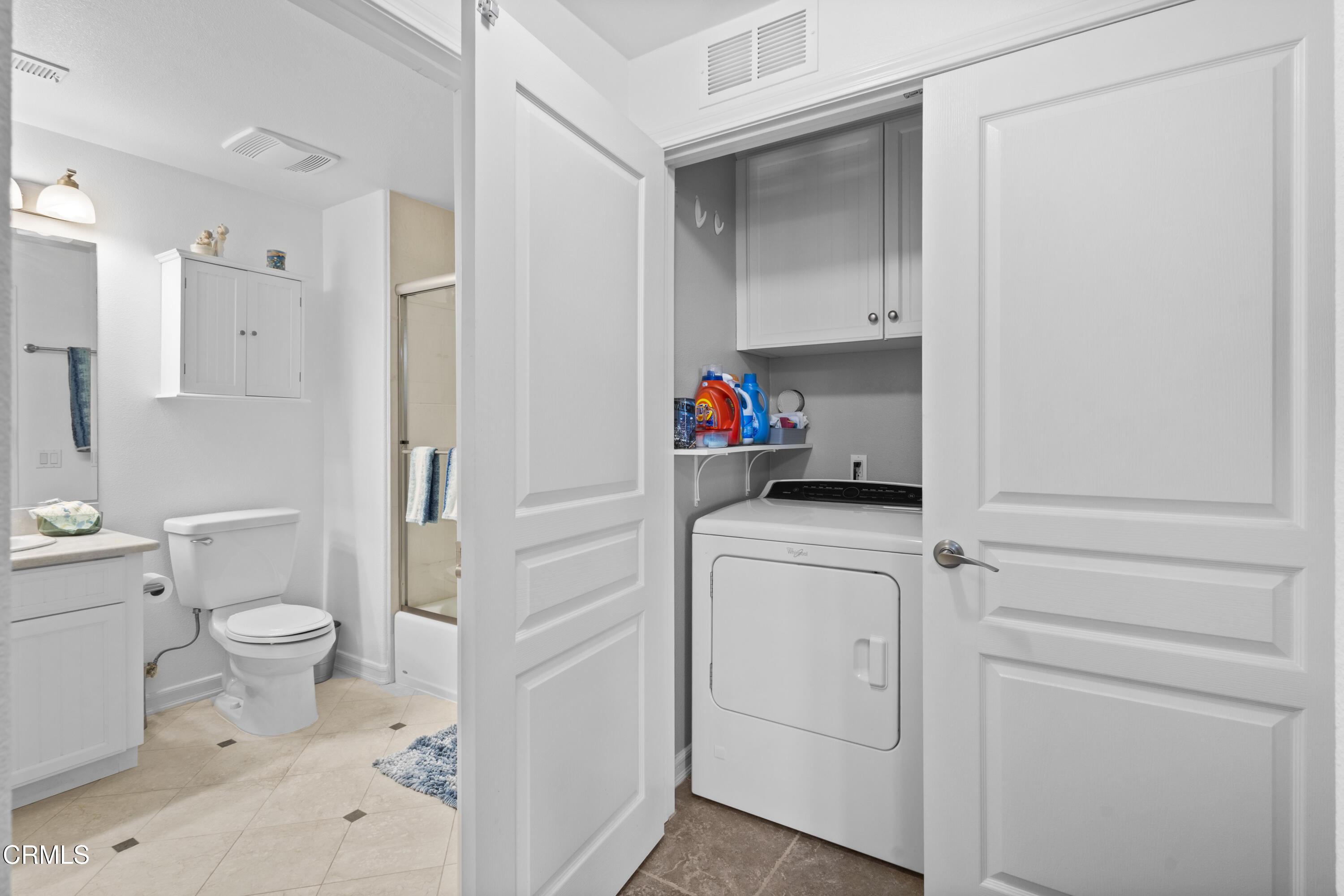 1536 Seabridge Lane Oxnard, CA 93035 - Photo 7 of 38 a bathroom with a sink toilet vanity and tub