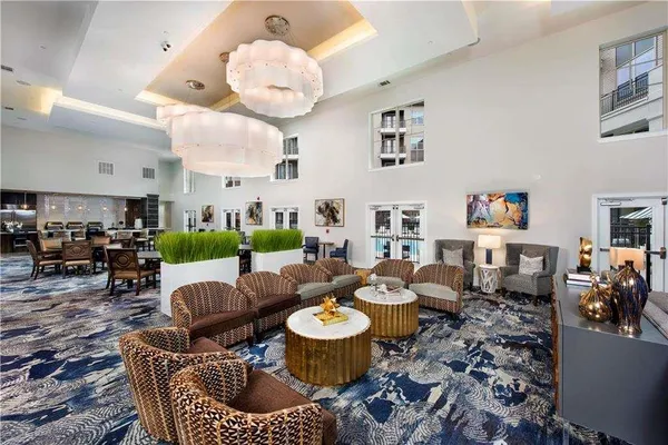 a living room with lots of furniture and decor