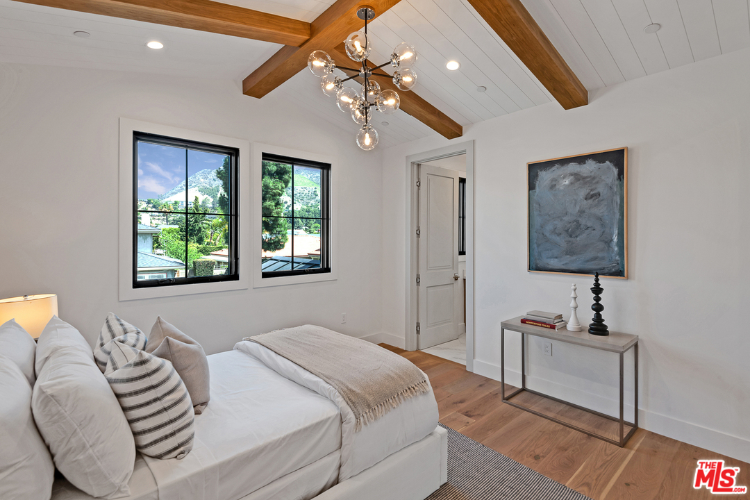 6310 Mirror Drive Los Angeles, CA 90068 - Photo 32 of 49 a bedroom with furniture and a window