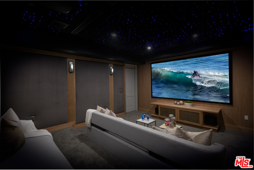 6310 Mirror Drive Los Angeles, CA 90068 - Photo 38 of 49 a living room with furniture and a flat screen tv