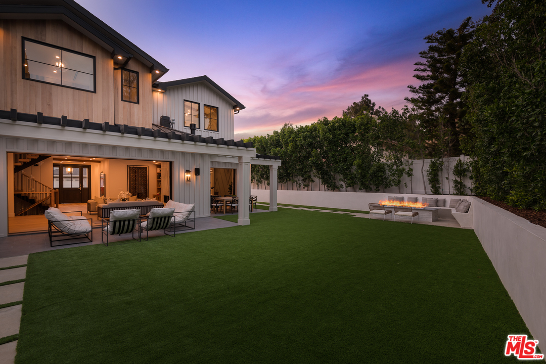 6310 Mirror Drive Los Angeles, CA 90068 - Photo 46 of 49 a front view of a house with a garden and porch